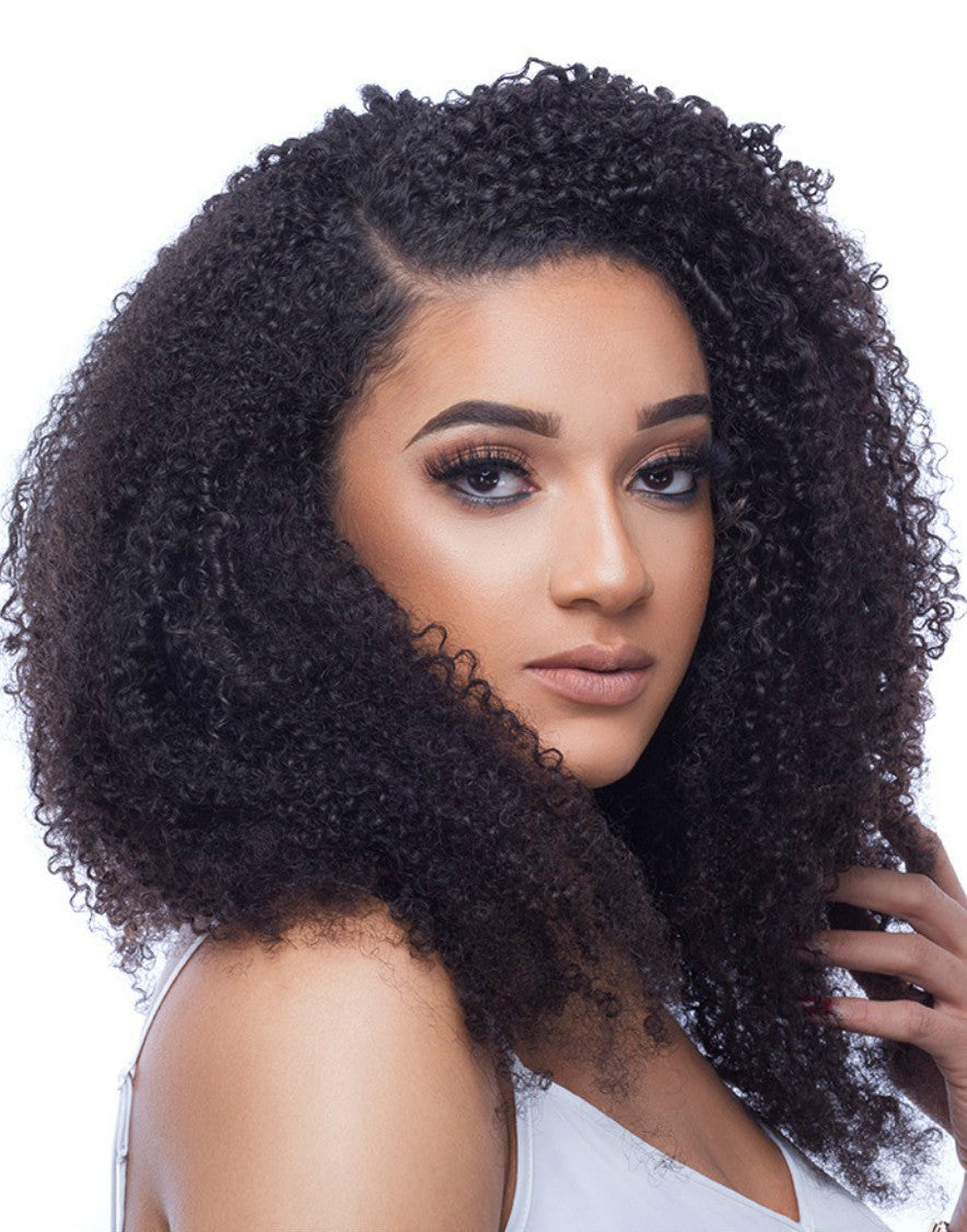 14" human hair kinky curly clip-ins on a woman.