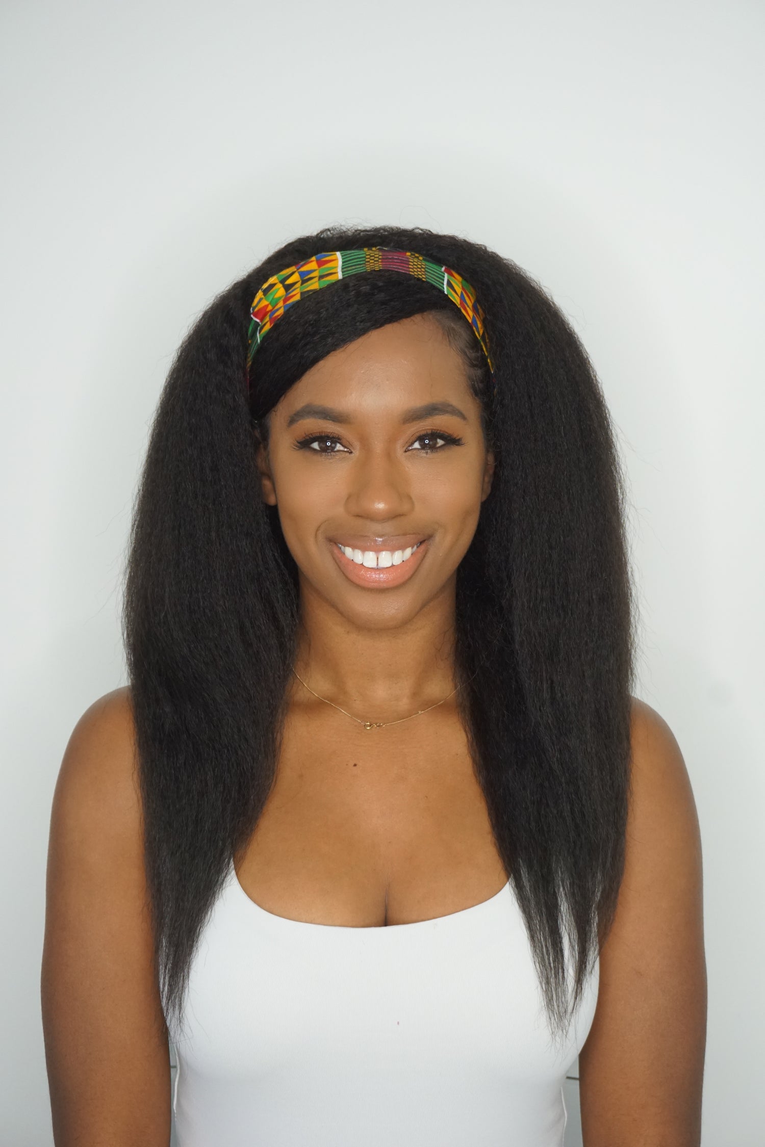 Human hair kinky straight headband wig on a black woman