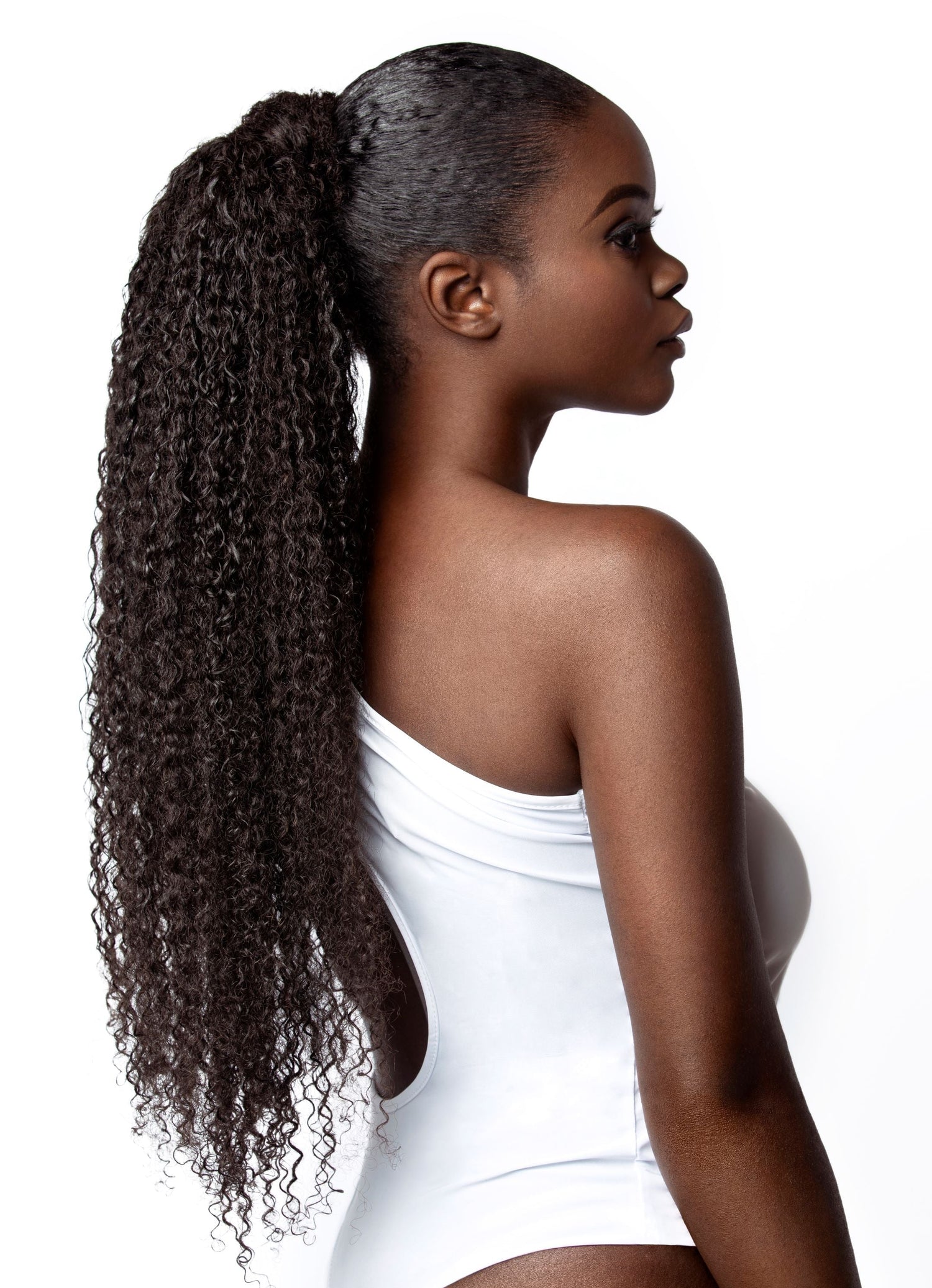 black woman with curly ponytail