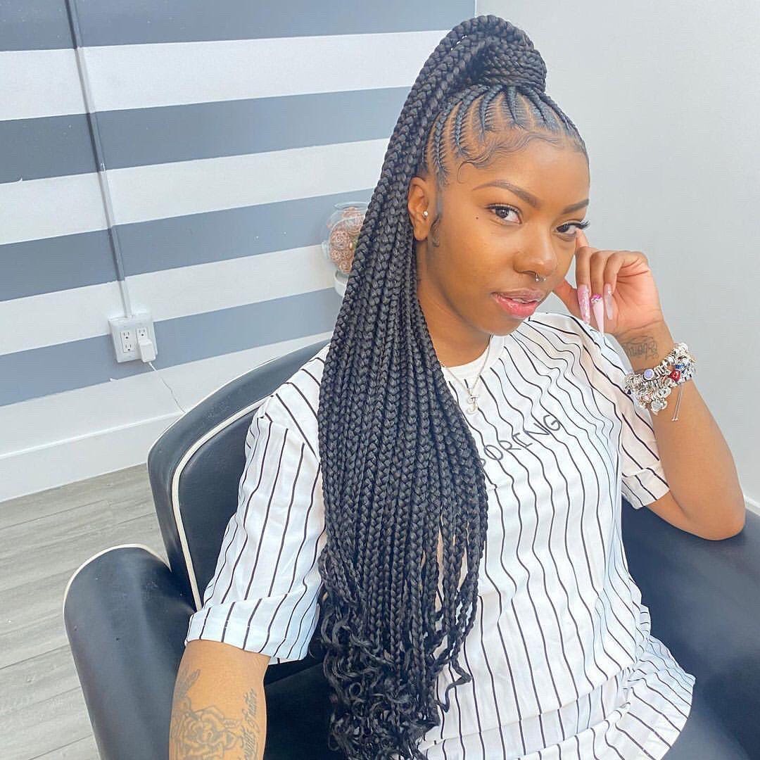 a girl with ponytail braids 