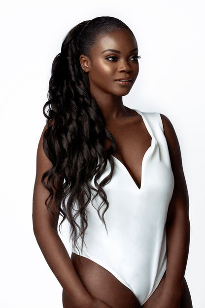 Brazilian curly body wave drawstrings ponytail on a black woman.