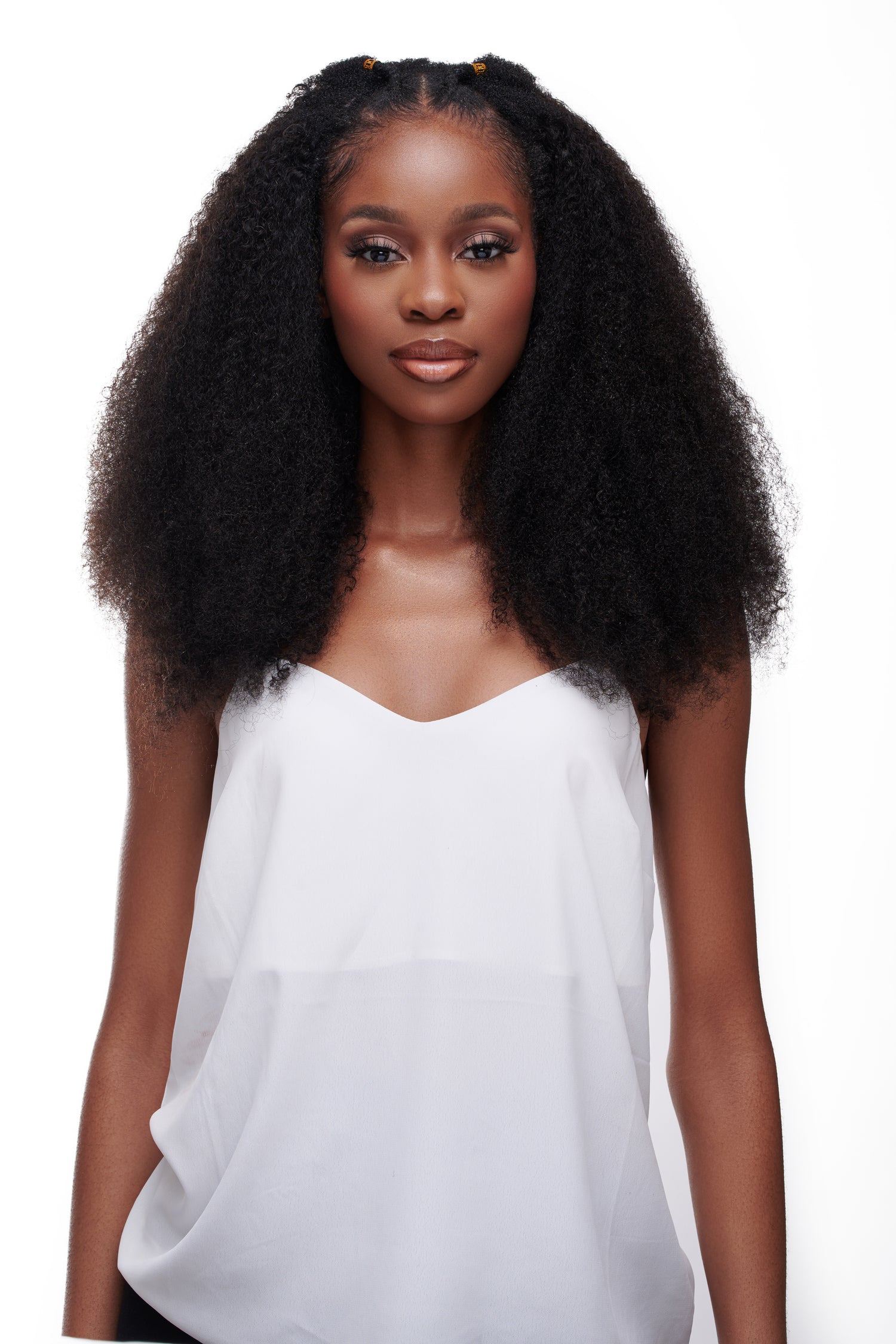 kinky curly natural hair U-part wig on a black girl.
